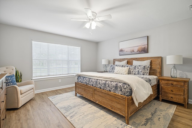 865 Indigo Loop, Destin, FL 32550 - bedroom with baseboards, wood finished floors, and ceiling fan