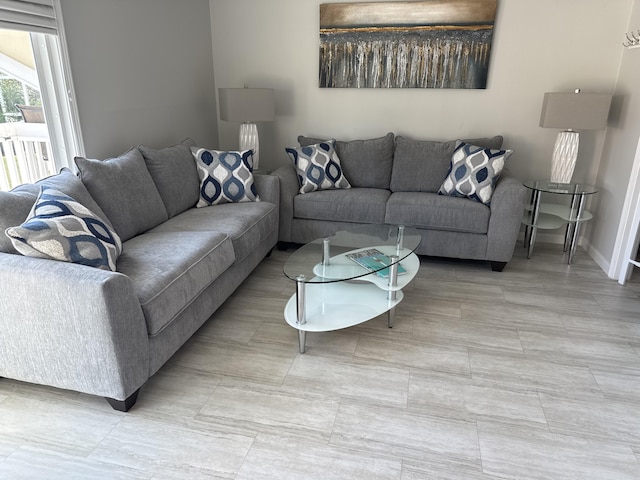 775 Gulf Shore Dr Unit 1041, Destin, FL 32541 - living room featuring baseboards
