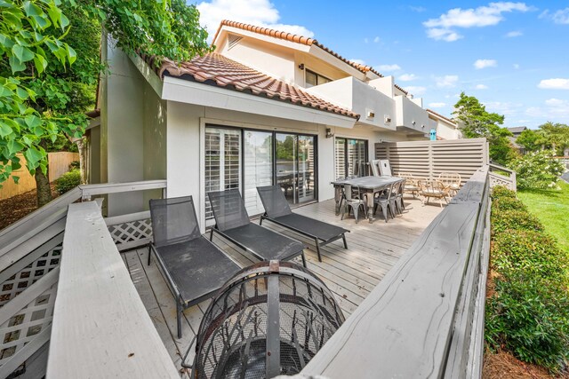 5209 Beachwalk Dr, Miramar Beach, FL 32550 - deck with outdoor dining space