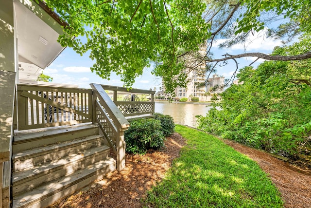 5209 Beachwalk Dr, Miramar Beach, FL 32550 - view of yard with a deck with water view