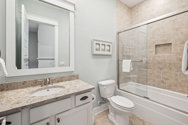 25 E Pine Lands Loop Unit B, Inlet Beach, FL 32461 - bathroom featuring vanity, toilet, shower / bath combination with glass door, baseboards, and tile patterned floors