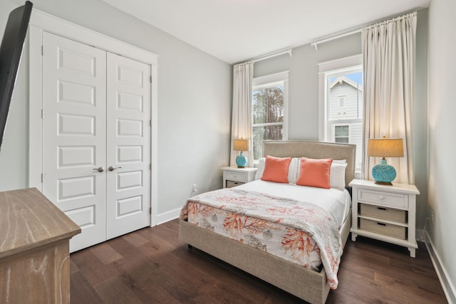 25 E Pine Lands Loop Unit B, Inlet Beach, FL 32461 - bedroom with dark wood-type flooring, a closet, and baseboards