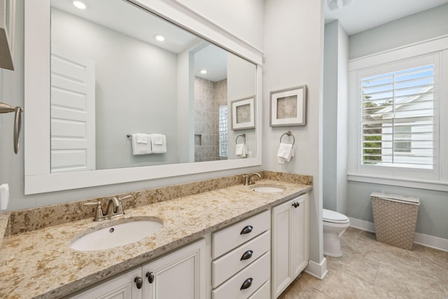 25 E Pine Lands Loop Unit B, Inlet Beach, FL 32461 - full bathroom featuring double vanity, toilet, baseboards, and tile patterned floors