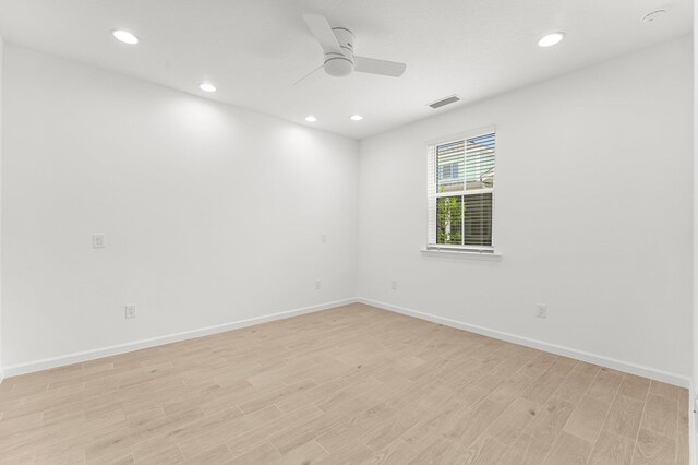 8454 Dreams Float Ct, Panama City Beach, FL 32413 - empty room with light wood finished floors, a ceiling fan, recessed lighting, and baseboards