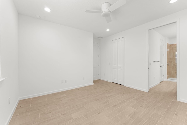 8454 Dreams Float Ct, Panama City Beach, FL 32413 - unfurnished bedroom with light wood-style flooring, recessed lighting, baseboards, ceiling fan, and a closet