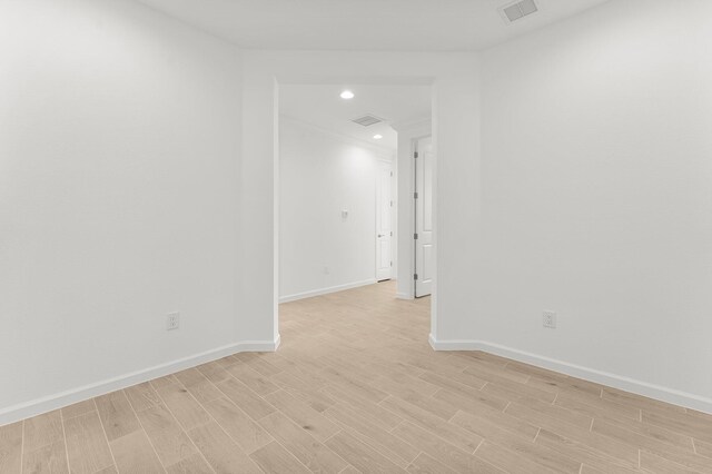 8454 Dreams Float Ct, Panama City Beach, FL 32413 - spare room featuring light wood finished floors, baseboards, and recessed lighting