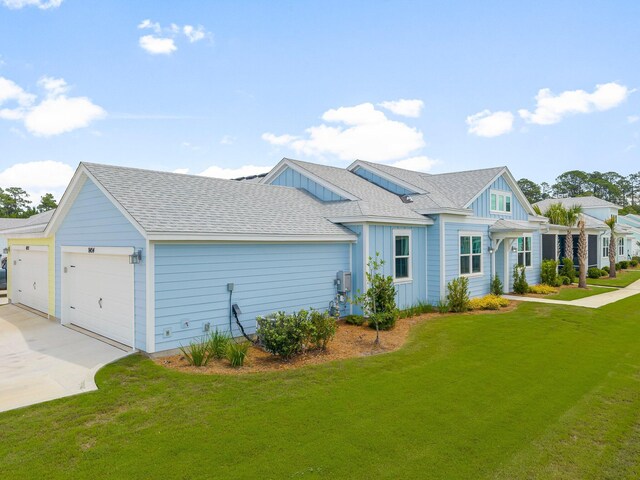 8454 Dreams Float Ct, Panama City Beach, FL 32413 - view of front of house featuring board and batten siding, an attached garage, driveway, a front lawn, and a pergola