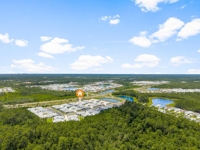 8454 Dreams Float Ct, Panama City Beach, FL 32413 - bird's eye view of a nearby body of water and a forest