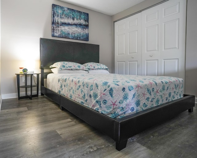 364 Bluefish Dr Unit 102, Fort Walton Beach, FL 32548 - bedroom featuring a closet, wood finished floors, and baseboards