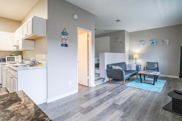 364 Bluefish Dr Unit 102, Fort Walton Beach, FL 32548 - living room featuring light wood-style floors and baseboards