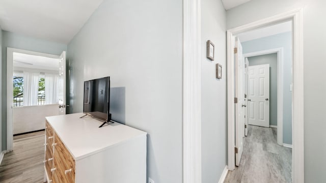 11 Beachside Dr Unit 722, Santa Rosa Beach, FL 32459 - hallway featuring light wood-type flooring and baseboards