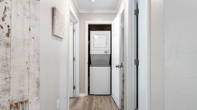 11 Beachside Dr Unit 722, Santa Rosa Beach, FL 32459 - hall with stacked washer and clothes dryer and wood finished floors
