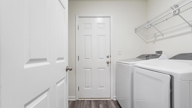 720 Riverwalk Cir, Freeport, FL 32439 - laundry room with separate washer and dryer and dark wood finished floors