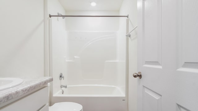 720 Riverwalk Cir, Freeport, FL 32439 - bathroom featuring vanity, toilet, and tub / shower combination