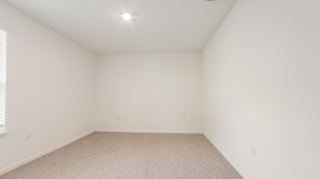 720 Riverwalk Cir, Freeport, FL 32439 - spare room with light carpet and baseboards