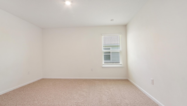 720 Riverwalk Cir, Freeport, FL 32439 - empty room featuring carpet flooring and baseboards