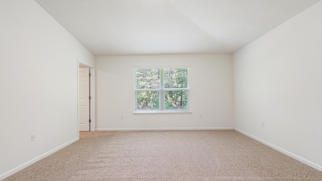 720 Riverwalk Cir, Freeport, FL 32439 - spare room featuring light colored carpet and baseboards
