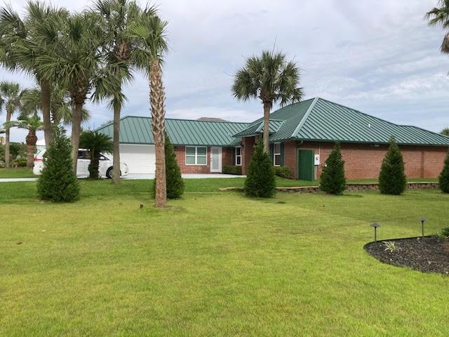 6735 Tidewater Dr, Navarre, FL 32566 - view of green lawn