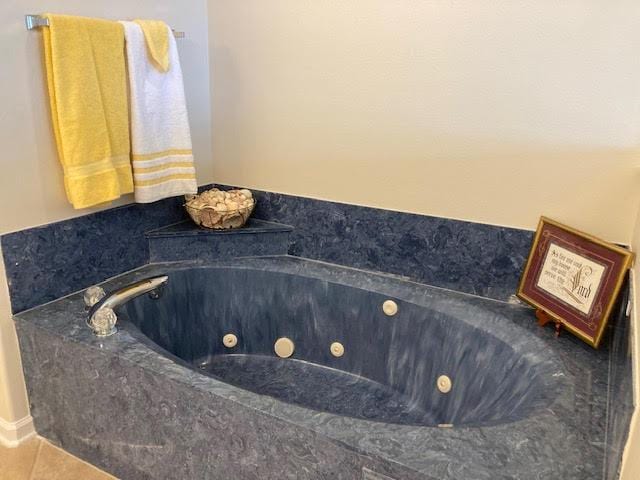 6735 Tidewater Dr, Navarre, FL 32566 - full bathroom with a tub with jets