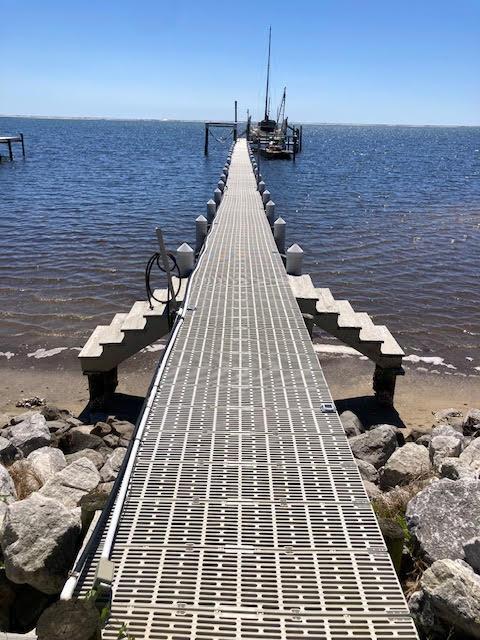 6735 Tidewater Dr, Navarre, FL 32566 - dock featuring a water view