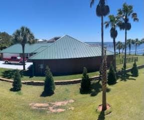 6735 Tidewater Dr, Navarre, FL 32566 - view of community featuring a lawn