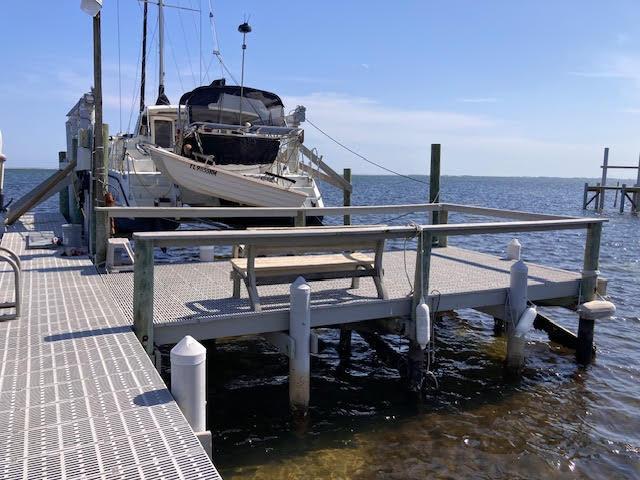 6735 Tidewater Dr, Navarre, FL 32566 - dock area with boat lift and a water view