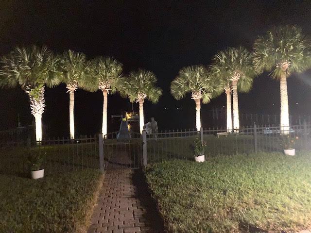 6735 Tidewater Dr, Navarre, FL 32566 - view of yard at night