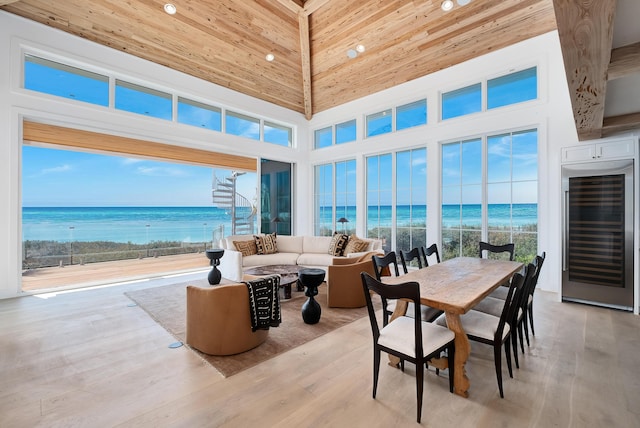 40 Jasmine Cir, Santa Rosa Beach, FL 32459 - sunroom with wine cooler, healthy amount of natural light, and view of water and beach