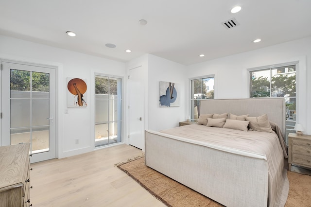 40 Jasmine Cir, Santa Rosa Beach, FL 32459 - bedroom featuring light wood-type flooring, recessed lighting, and access to exterior