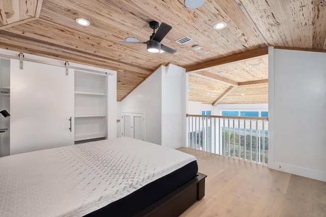 40 Jasmine Cir, Santa Rosa Beach, FL 32459 - bedroom featuring wooden ceiling, wood finished floors, a barn door, recessed lighting, and access to outside