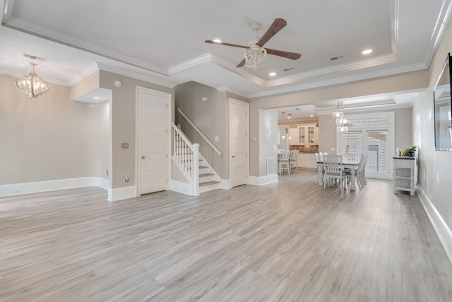 4134 Cobalt Cir Unit Ro14, Panama City, FL 32408 - living room with stairs, a ceiling fan, baseboards, a chandelier, and light wood finished floors