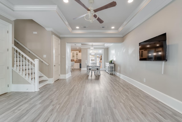 4134 Cobalt Cir Unit Ro14, Panama City, FL 32408 - living area with a ceiling fan, stairs, light wood-style floors, crown molding, and baseboards