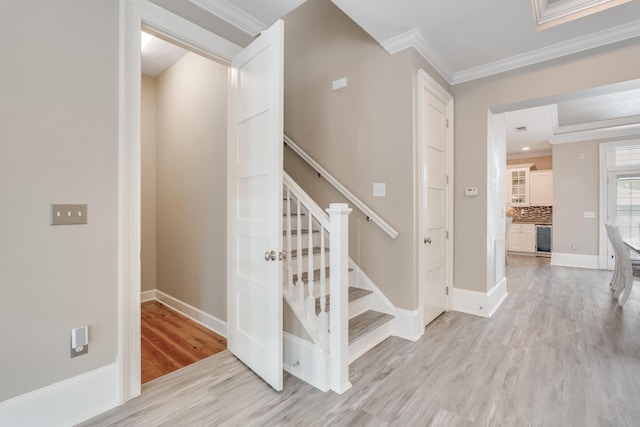 4134 Cobalt Cir Unit Ro14, Panama City, FL 32408 - stairs with wood finished floors, ornamental molding, and baseboards