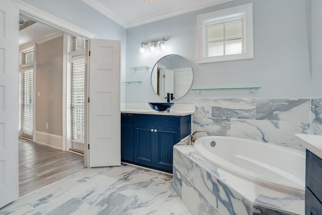 4134 Cobalt Cir Unit Ro14, Panama City, FL 32408 - full bath featuring vanity, a bath, ornamental molding, plenty of natural light, and marble finish floors