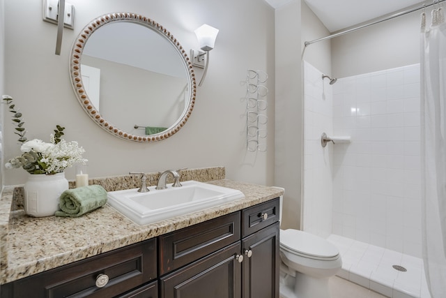 4134 Cobalt Cir Unit Ro14, Panama City, FL 32408 - bathroom with vanity, toilet, and tiled shower
