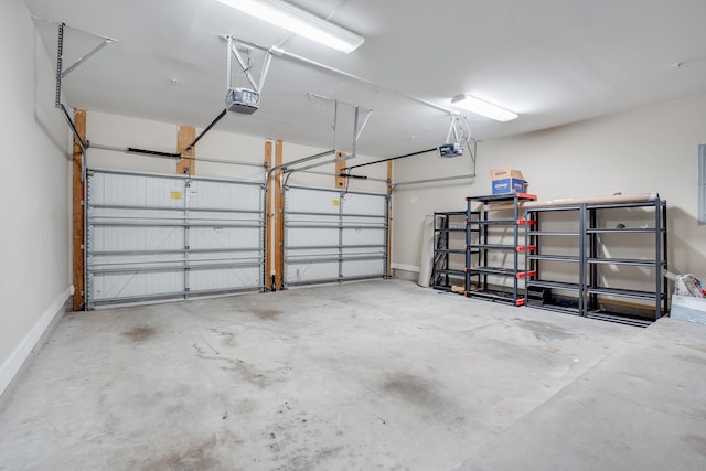 4134 Cobalt Cir Unit Ro14, Panama City, FL 32408 - garage with a garage door opener and baseboards