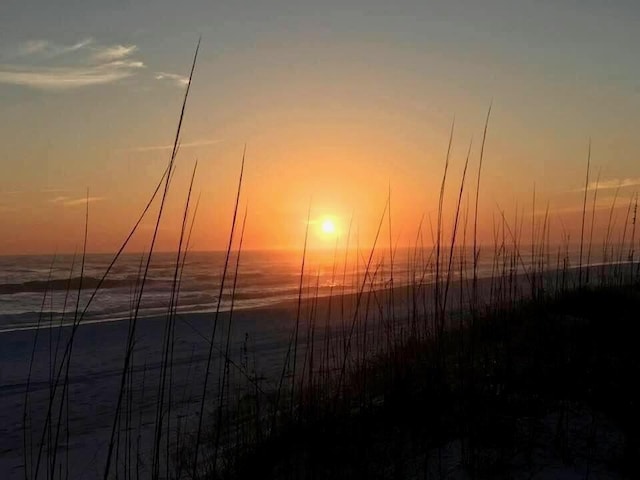 114 Mainsail Dr Unit 384, Miramar Beach, FL 32550 - view of mountain backdrop featuring a large body of water