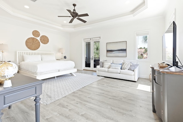 52 Tranquility Ln, Destin, FL 32541 - bedroom with a raised ceiling, access to outside, light wood-type flooring, ornamental molding, and ceiling fan