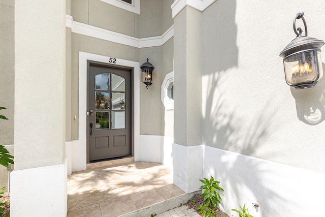 52 Tranquility Ln, Destin, FL 32541 - property entrance featuring stucco siding