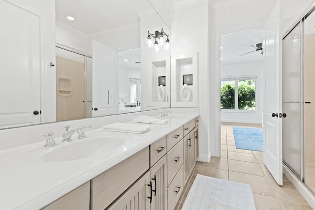 52 Tranquility Ln, Destin, FL 32541 - full bathroom featuring double vanity, crown molding, tile patterned flooring, a stall shower, and recessed lighting