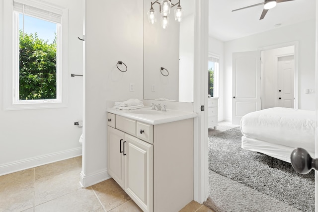 52 Tranquility Ln, Destin, FL 32541 - bathroom featuring vanity, healthy amount of natural light, ceiling fan, and baseboards