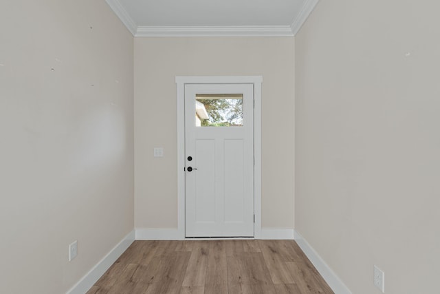 1511 23rd St, Niceville, FL 32578 - foyer entrance featuring light wood-style flooring, ornamental molding, and baseboards