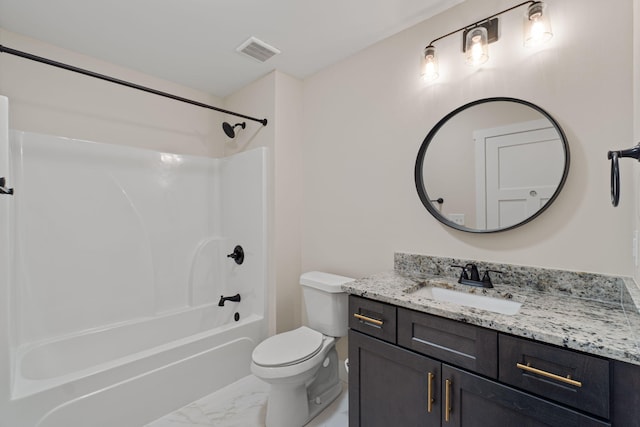 1511 23rd St, Niceville, FL 32578 - bathroom featuring vanity, marble look tile flooring, shower / washtub combination, and toilet