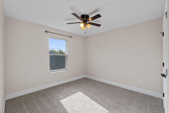 1511 23rd St, Niceville, FL 32578 - carpeted spare room featuring a ceiling fan and baseboards