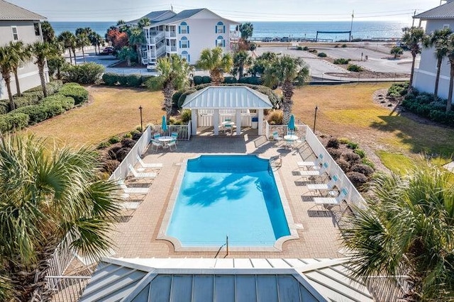 2410 Scenic Gulf Dr Unit 101C, Miramar Beach, FL 32550 - view of swimming pool with a patio, a storage structure, and an outdoor structure