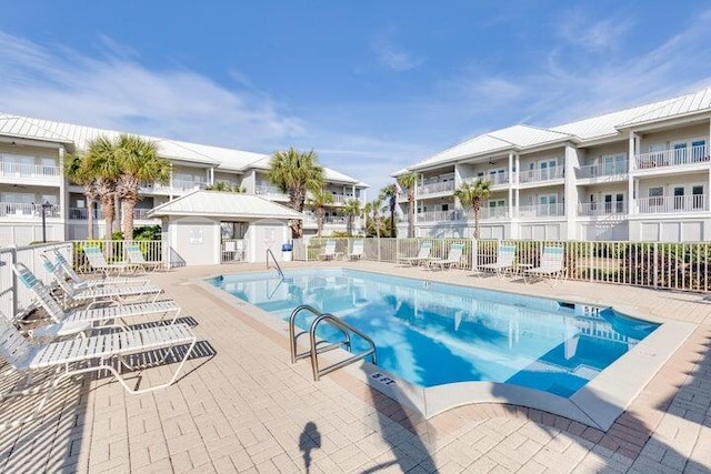 2410 Scenic Gulf Dr Unit 101C, Miramar Beach, FL 32550 - community pool featuring a patio area