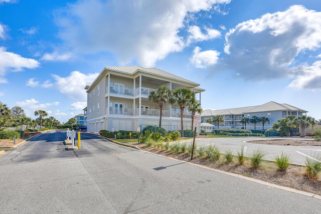 2410 Scenic Gulf Dr Unit 101C, Miramar Beach, FL 32550 - view of asphalt street with a gated entry