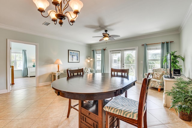 2410 Scenic Gulf Dr Unit 101C, Miramar Beach, FL 32550 - dining area featuring light tile patterned floors, healthy amount of natural light, crown molding, a chandelier, and a ceiling fan