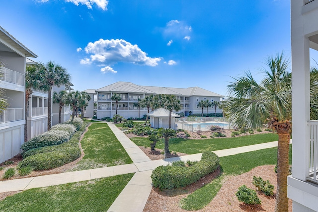 2410 Scenic Gulf Dr Unit 101C, Miramar Beach, FL 32550 - surrounding community featuring a yard and a residential view