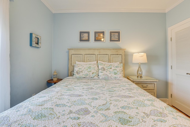 2410 Scenic Gulf Dr Unit 101C, Miramar Beach, FL 32550 - bedroom with crown molding and a closet